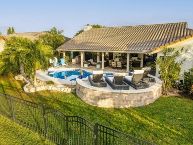 Discover this stunning home nestled in a vibrant community that on Osprey Point Golf Course in Florida - for sale on GolfHomes.com, golf home, golf lot