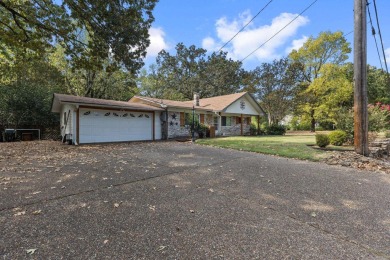 Introducing a beautiful 3 bed, 2 bath home in the prestigious on Hot Springs Golf and Country Club in Arkansas - for sale on GolfHomes.com, golf home, golf lot