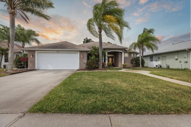 This beautiful home is located on the serene greens of the golf on Viera East Golf Club in Florida - for sale on GolfHomes.com, golf home, golf lot