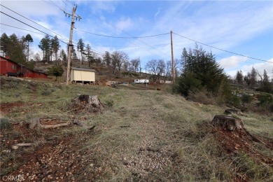 Close to a half acre, this ample lot includes a level building on Adam Springs Golf Course in California - for sale on GolfHomes.com, golf home, golf lot