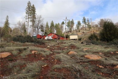 Close to a half acre, this ample lot includes a level building on Adam Springs Golf Course in California - for sale on GolfHomes.com, golf home, golf lot