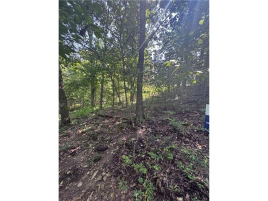 Beautiful cul-de-sac lot is only blocks from Lake Brittany & on Bella Vista - Metfield Golf Complex and Country Club in Arkansas - for sale on GolfHomes.com, golf home, golf lot