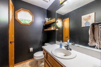 As lovely as ever!  This 4-bedroom home on a quiet dead-end on Treynor Recreation Area in Iowa - for sale on GolfHomes.com, golf home, golf lot