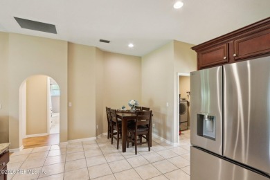 Stunning home with pond view in the sought-after Eagle Harbor on Eagle Harbor Golf Club in Florida - for sale on GolfHomes.com, golf home, golf lot