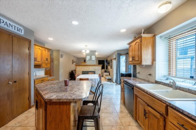 As lovely as ever!  This 4-bedroom home on a quiet dead-end on Treynor Recreation Area in Iowa - for sale on GolfHomes.com, golf home, golf lot