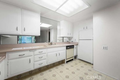 Secluded corner unit in Leisure World Mutual 8! This home is in on Leisure World Seal Beach Golf Course in California - for sale on GolfHomes.com, golf home, golf lot