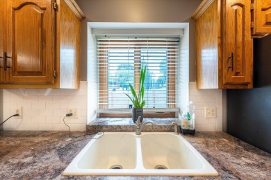 As lovely as ever!  This 4-bedroom home on a quiet dead-end on Treynor Recreation Area in Iowa - for sale on GolfHomes.com, golf home, golf lot