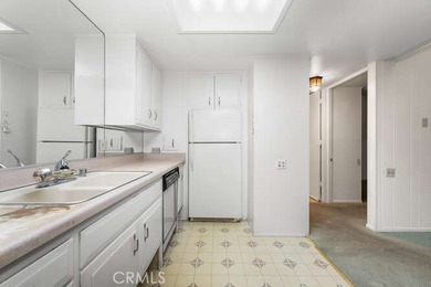 Secluded corner unit in Leisure World Mutual 8! This home is in on Leisure World Seal Beach Golf Course in California - for sale on GolfHomes.com, golf home, golf lot