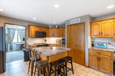As lovely as ever!  This 4-bedroom home on a quiet dead-end on Treynor Recreation Area in Iowa - for sale on GolfHomes.com, golf home, golf lot
