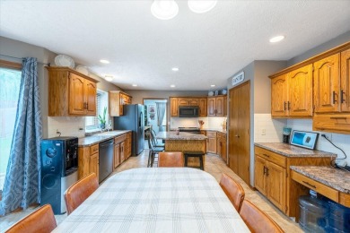 As lovely as ever!  This 4-bedroom home on a quiet dead-end on Treynor Recreation Area in Iowa - for sale on GolfHomes.com, golf home, golf lot