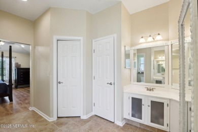 Stunning home with pond view in the sought-after Eagle Harbor on Eagle Harbor Golf Club in Florida - for sale on GolfHomes.com, golf home, golf lot