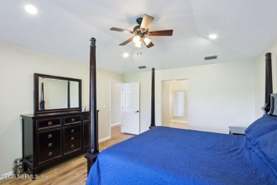 Stunning home with pond view in the sought-after Eagle Harbor on Eagle Harbor Golf Club in Florida - for sale on GolfHomes.com, golf home, golf lot