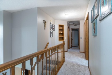 As lovely as ever!  This 4-bedroom home on a quiet dead-end on Treynor Recreation Area in Iowa - for sale on GolfHomes.com, golf home, golf lot