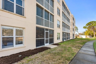 Totally renovated first floor unit.  Enjoy your lanai and pond on Pinebrook/Ironwood Golf Course in Florida - for sale on GolfHomes.com, golf home, golf lot