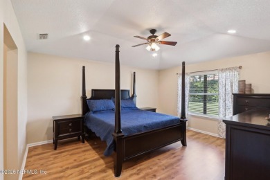 Stunning home with pond view in the sought-after Eagle Harbor on Eagle Harbor Golf Club in Florida - for sale on GolfHomes.com, golf home, golf lot