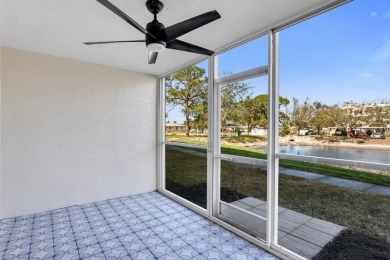 Totally renovated first floor unit.  Enjoy your lanai and pond on Pinebrook/Ironwood Golf Course in Florida - for sale on GolfHomes.com, golf home, golf lot