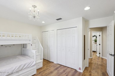 Stunning home with pond view in the sought-after Eagle Harbor on Eagle Harbor Golf Club in Florida - for sale on GolfHomes.com, golf home, golf lot