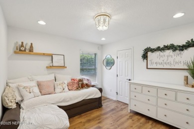 Stunning home with pond view in the sought-after Eagle Harbor on Eagle Harbor Golf Club in Florida - for sale on GolfHomes.com, golf home, golf lot