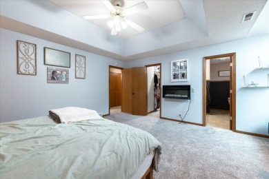 As lovely as ever!  This 4-bedroom home on a quiet dead-end on Treynor Recreation Area in Iowa - for sale on GolfHomes.com, golf home, golf lot