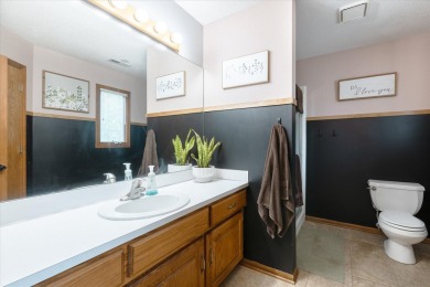 As lovely as ever!  This 4-bedroom home on a quiet dead-end on Treynor Recreation Area in Iowa - for sale on GolfHomes.com, golf home, golf lot