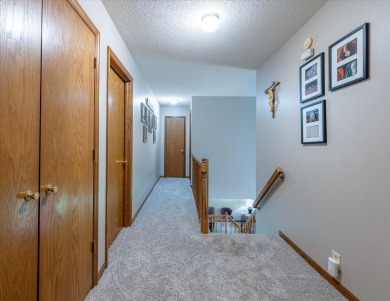 As lovely as ever!  This 4-bedroom home on a quiet dead-end on Treynor Recreation Area in Iowa - for sale on GolfHomes.com, golf home, golf lot