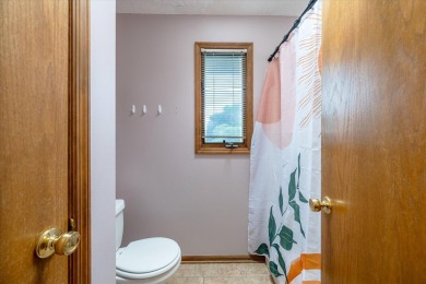 As lovely as ever!  This 4-bedroom home on a quiet dead-end on Treynor Recreation Area in Iowa - for sale on GolfHomes.com, golf home, golf lot