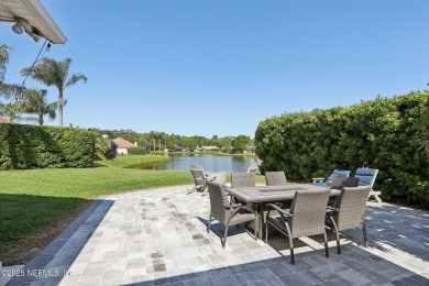 Stunning home with pond view in the sought-after Eagle Harbor on Eagle Harbor Golf Club in Florida - for sale on GolfHomes.com, golf home, golf lot