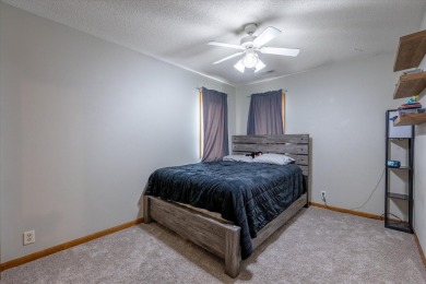 As lovely as ever!  This 4-bedroom home on a quiet dead-end on Treynor Recreation Area in Iowa - for sale on GolfHomes.com, golf home, golf lot