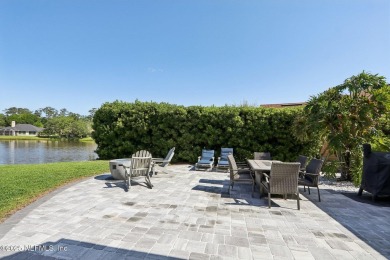 Stunning home with pond view in the sought-after Eagle Harbor on Eagle Harbor Golf Club in Florida - for sale on GolfHomes.com, golf home, golf lot