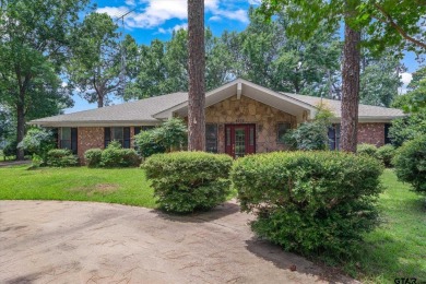 Here is your opportunity to own a big, beautiful home located on on Holly Lake Ranch Golf Club in Texas - for sale on GolfHomes.com, golf home, golf lot