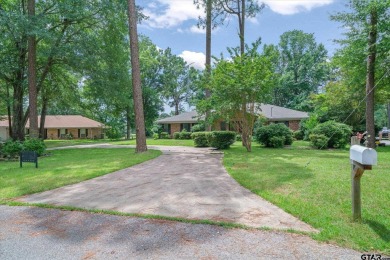 Here is your opportunity to own a big, beautiful home located on on Holly Lake Ranch Golf Club in Texas - for sale on GolfHomes.com, golf home, golf lot