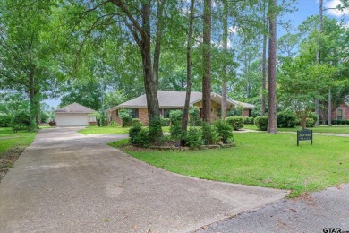 Here is your opportunity to own a big, beautiful home located on on Holly Lake Ranch Golf Club in Texas - for sale on GolfHomes.com, golf home, golf lot