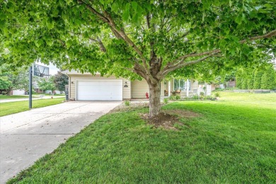 As lovely as ever!  This 4-bedroom home on a quiet dead-end on Treynor Recreation Area in Iowa - for sale on GolfHomes.com, golf home, golf lot
