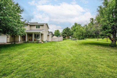 As lovely as ever!  This 4-bedroom home on a quiet dead-end on Treynor Recreation Area in Iowa - for sale on GolfHomes.com, golf home, golf lot