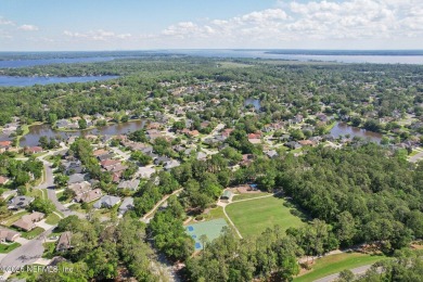 Stunning home with pond view in the sought-after Eagle Harbor on Eagle Harbor Golf Club in Florida - for sale on GolfHomes.com, golf home, golf lot
