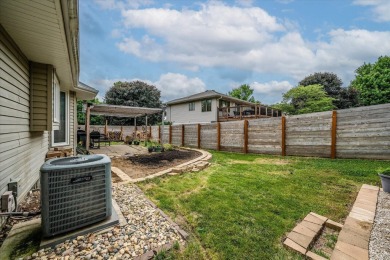 As lovely as ever!  This 4-bedroom home on a quiet dead-end on Treynor Recreation Area in Iowa - for sale on GolfHomes.com, golf home, golf lot