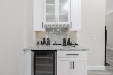 Luxury Golf Course Living with Lake Views on Twin Isles Country on Twin Isles Country Club in Florida - for sale on GolfHomes.com, golf home, golf lot