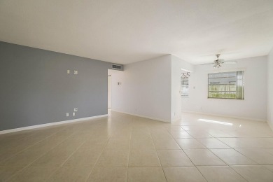 Easy Living with Golf Course Views in the Heart of Kings Point! on Kings Point Golf -Flanders Way in Florida - for sale on GolfHomes.com, golf home, golf lot