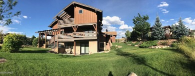 Custom home like no other in Eagle Ranch! Situated as far back on Eagle Ranch in Colorado - for sale on GolfHomes.com, golf home, golf lot