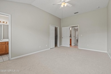 This charming one-story townhome offers easy living in the on Hidden Hills Country Club in Florida - for sale on GolfHomes.com, golf home, golf lot