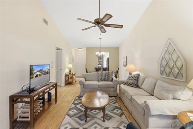 This Greenbriar upstairs unit offers a serene living experience on Citrus Hills Golf Club in Florida - for sale on GolfHomes.com, golf home, golf lot