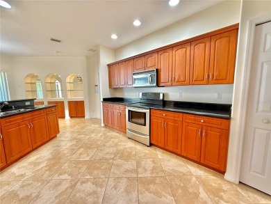Welcome to your new home in beautiful Palm Coast, Florida! This on The Grand Club Cypress Course in Florida - for sale on GolfHomes.com, golf home, golf lot