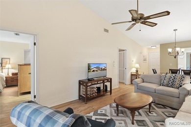 This Greenbriar upstairs unit offers a serene living experience on Citrus Hills Golf Club in Florida - for sale on GolfHomes.com, golf home, golf lot