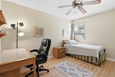 This Greenbriar upstairs unit offers a serene living experience on Citrus Hills Golf Club in Florida - for sale on GolfHomes.com, golf home, golf lot