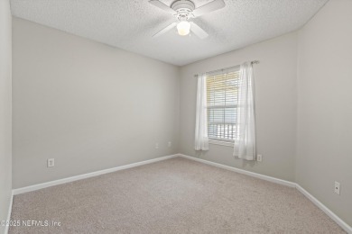 This charming one-story townhome offers easy living in the on Hidden Hills Country Club in Florida - for sale on GolfHomes.com, golf home, golf lot