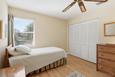 This Greenbriar upstairs unit offers a serene living experience on Citrus Hills Golf Club in Florida - for sale on GolfHomes.com, golf home, golf lot