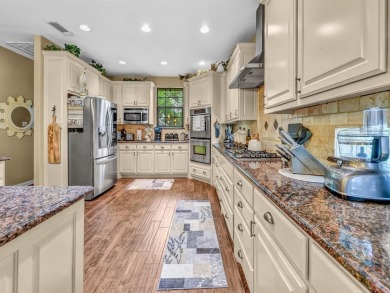 Welcome to 6100 Cherokee Dr, a warm and inviting retreat nestled on Pecan Plantation Country Club in Texas - for sale on GolfHomes.com, golf home, golf lot