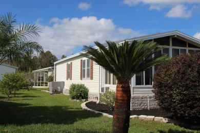 What a pretty curb apeal when entering this 2 bedroom home. ( on Schalamar Creek Golf and Country Club in Florida - for sale on GolfHomes.com, golf home, golf lot
