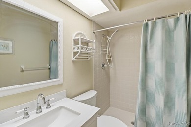 This Greenbriar upstairs unit offers a serene living experience on Citrus Hills Golf Club in Florida - for sale on GolfHomes.com, golf home, golf lot