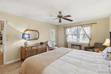 This Greenbriar upstairs unit offers a serene living experience on Citrus Hills Golf Club in Florida - for sale on GolfHomes.com, golf home, golf lot